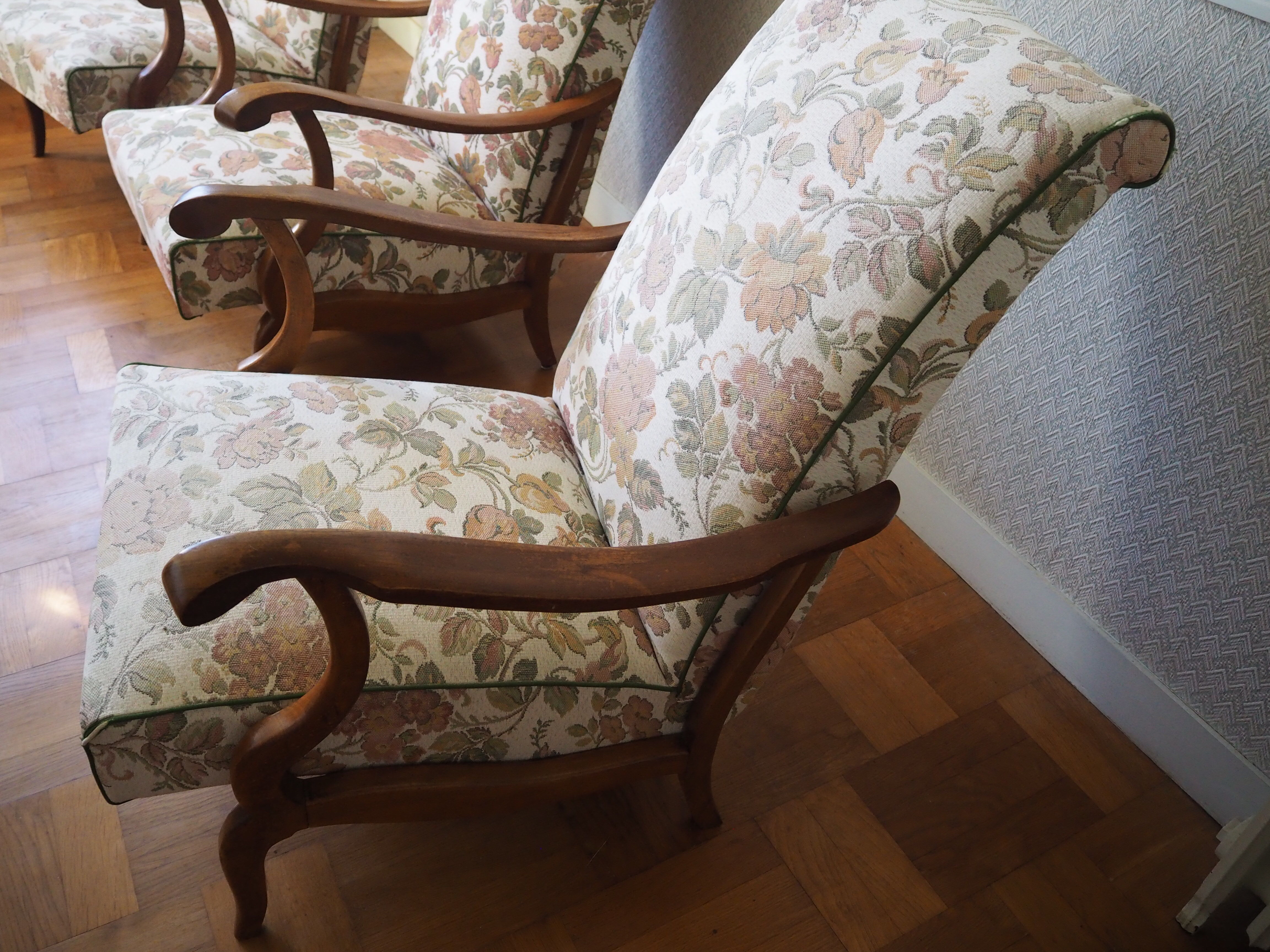 Four 1950s armchairs - wooden armrests