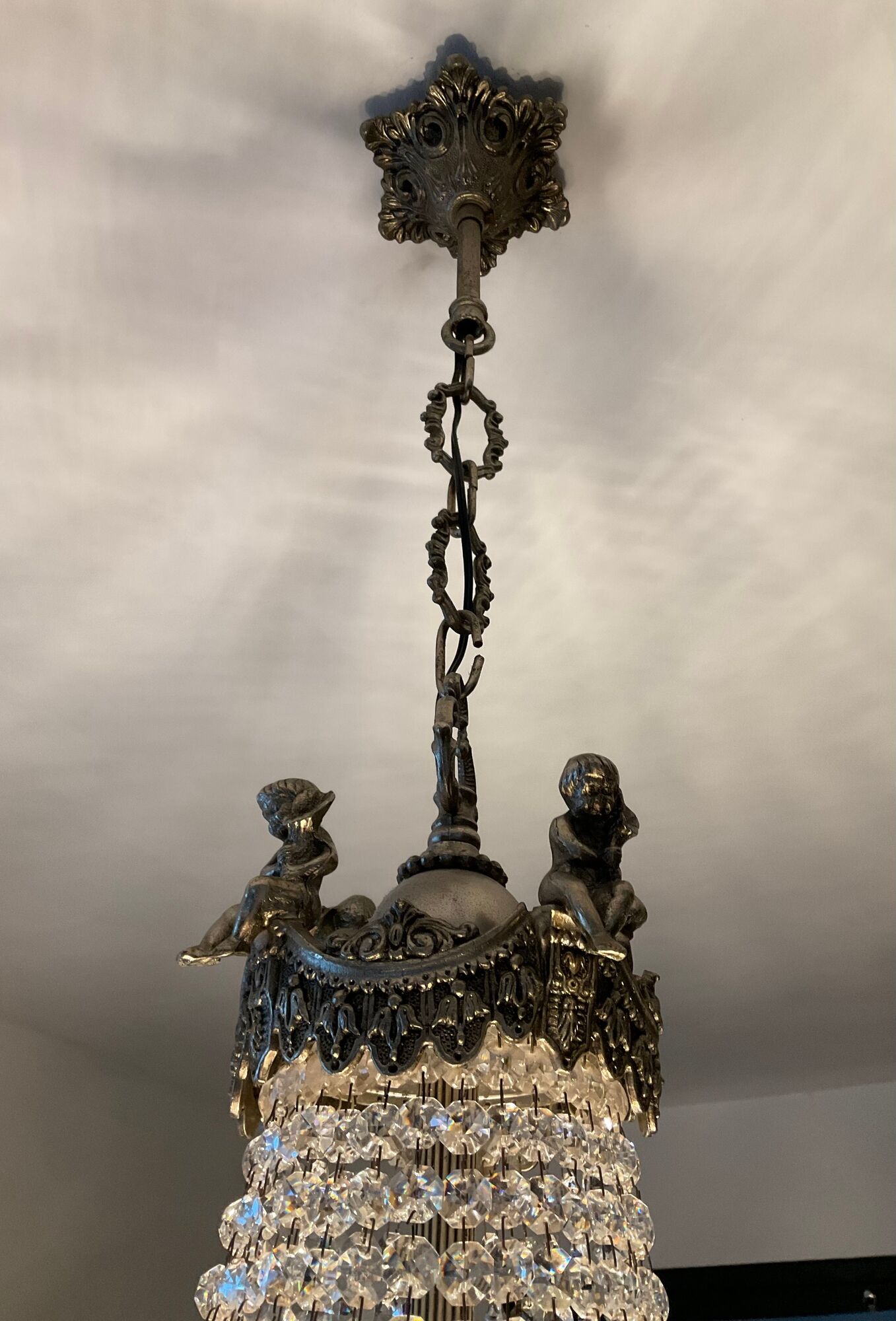 Old hot air balloon chandelier with crystal and bronze tassels