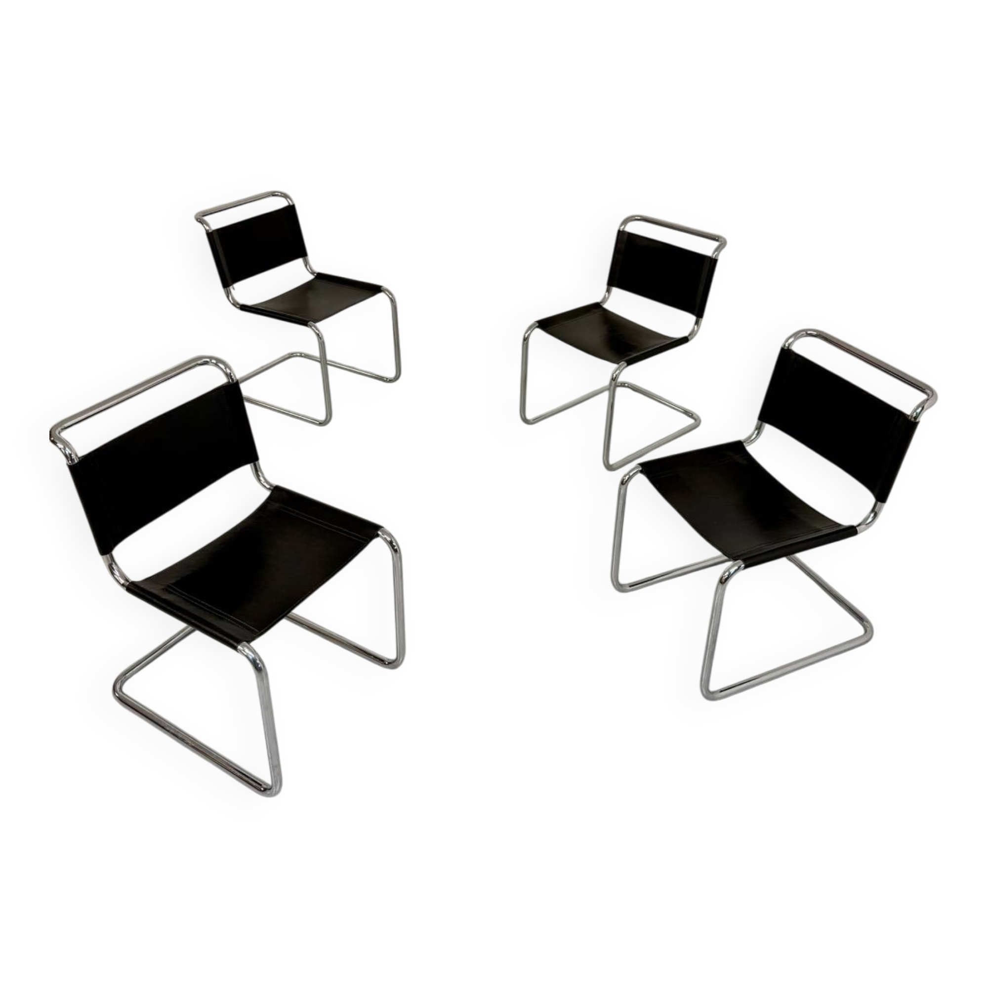 Lot of 4 tubular chairs designed by Mart Stam in vintage black leather from the 1980s.
