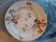 Ancien plat rond en faience de kg luneville a decor floral marron
