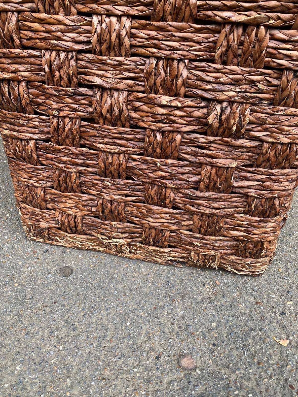 2 Scandinavian poufs in woven brown water hyacinth and leather