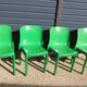 Set of 4 green Selene Magistretti chairs.