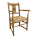 Fauteuil néo basque en bois clair et assise cannée