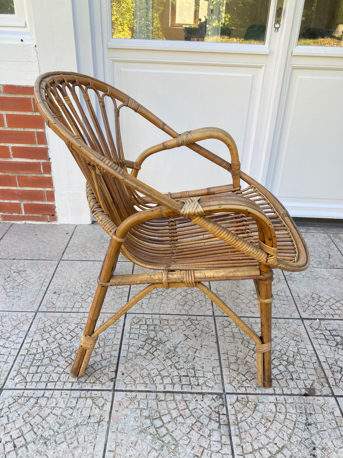 Vintage shell rattan armchair