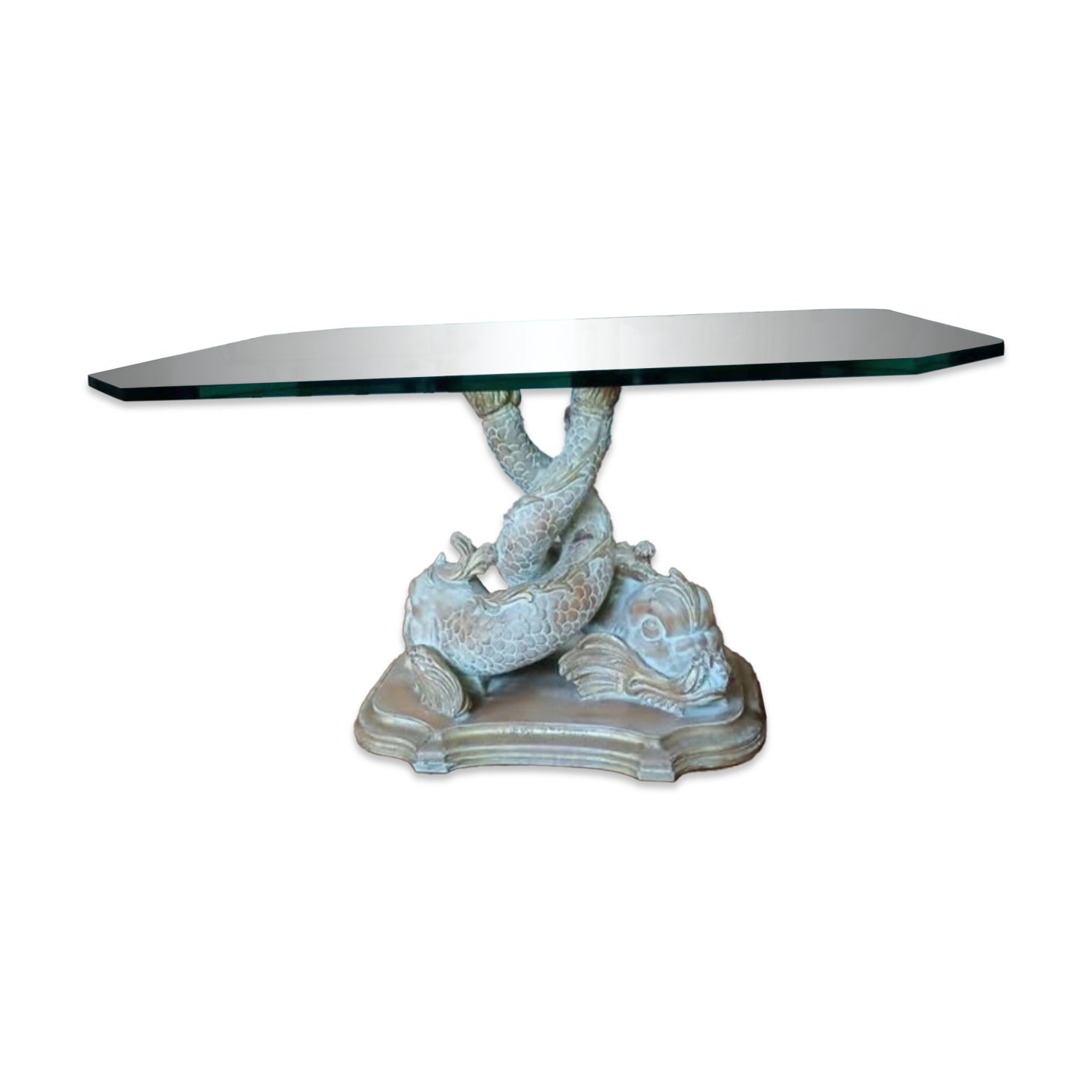 Glass table with carved wooden legs featuring intertwined fish.