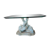Glass table with carved wooden legs featuring intertwined fish.