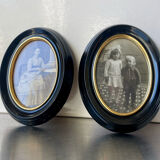Pair of black wooden oval frames 1880’s  each 13 cm x 10 cm glass measurements 8.5 cm x 5.5 cm