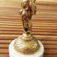 cherubic bronze lamp foot on marble base