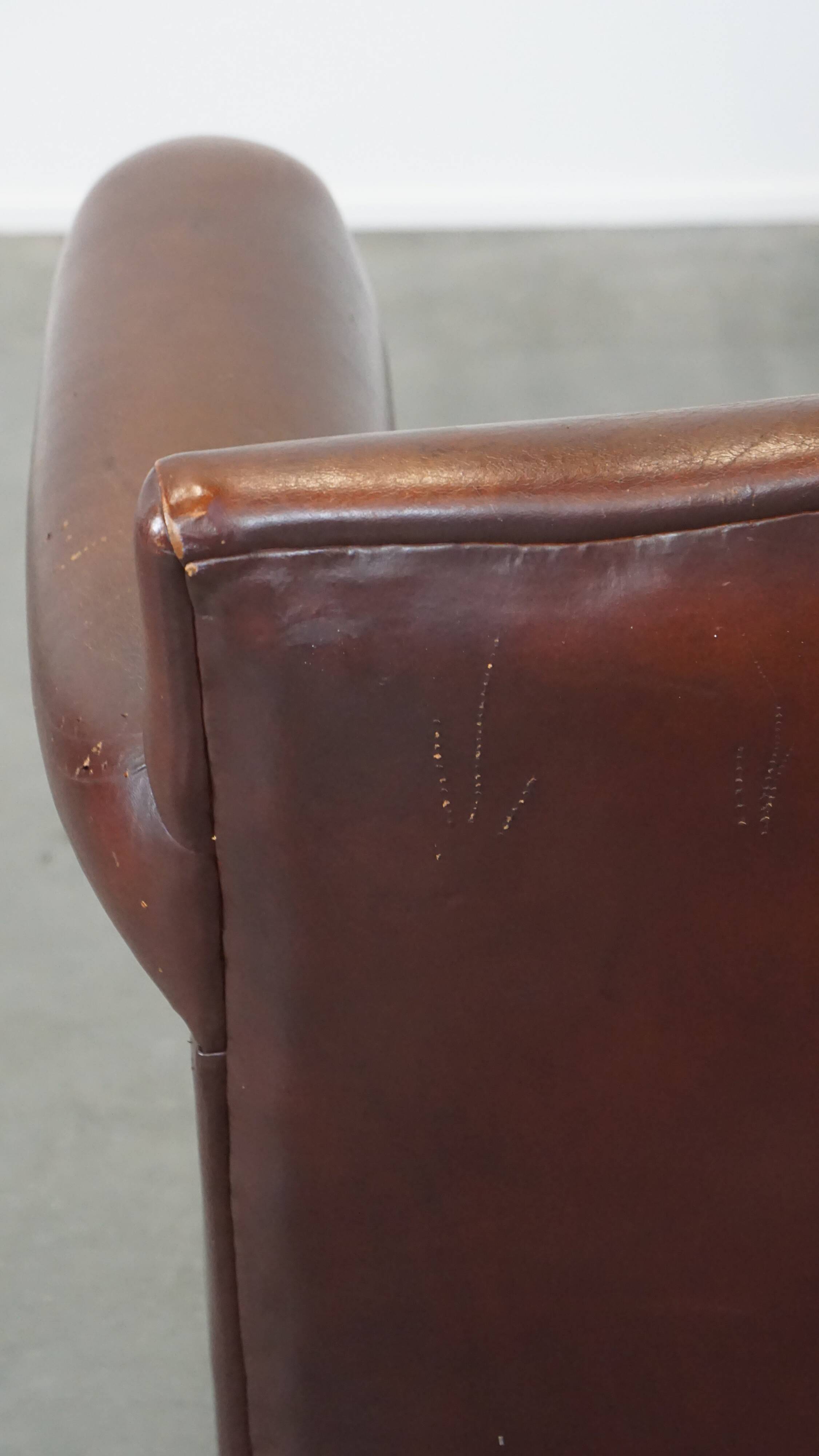 Design armchair made of sheep leather with a clean finish