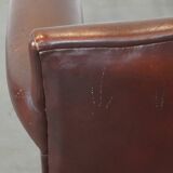 Design armchair made of sheep leather with a clean finish