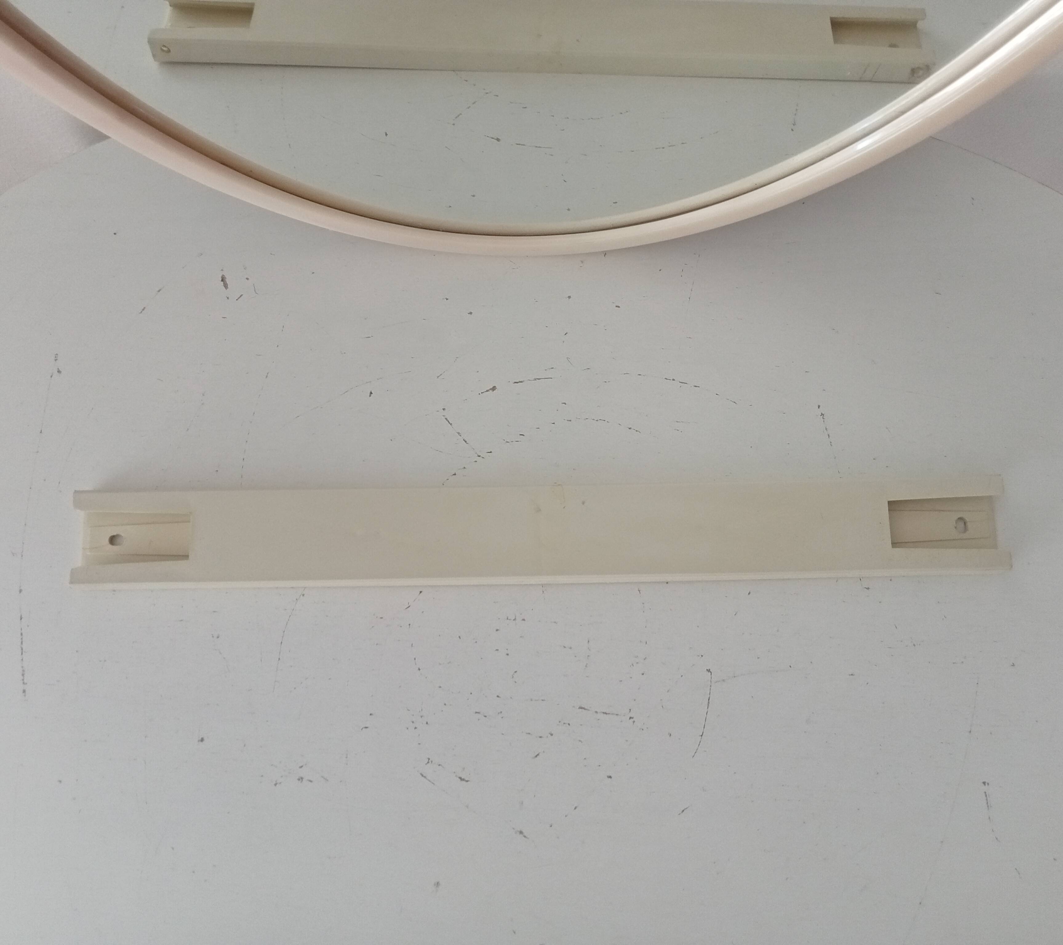 Vintage mirror with a marbled effect from the 70s.