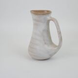 Signed white beige ceramic pitcher