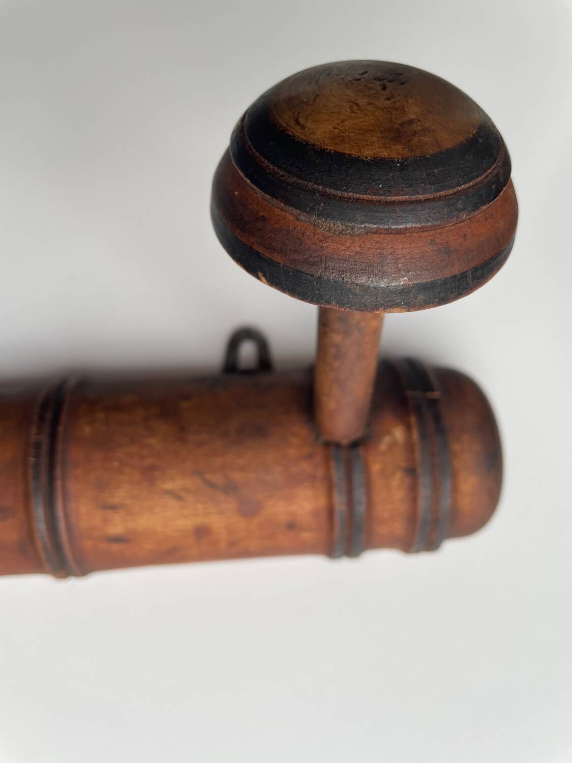 Wooden wall-mounted coat rack with two hooks