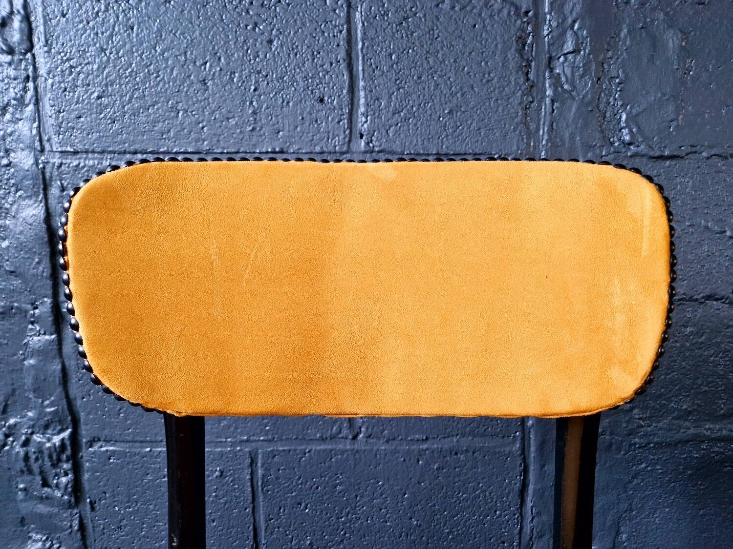 2 vintage chairs in black lacquered wood and yellow/mustard fabric, 1960