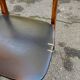 2 Scandinavian chairs in teak and black imitation leather, 1960s