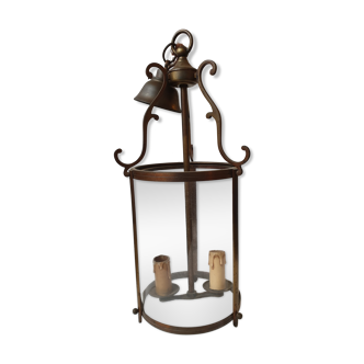 Ancient brass lantern and old bulging glass