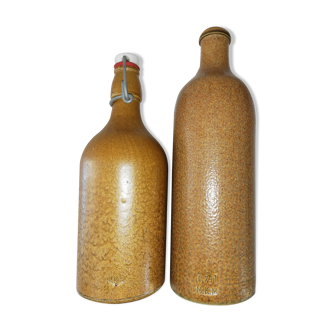 Pair of sandstone bottles