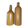 Pair of sandstone bottles