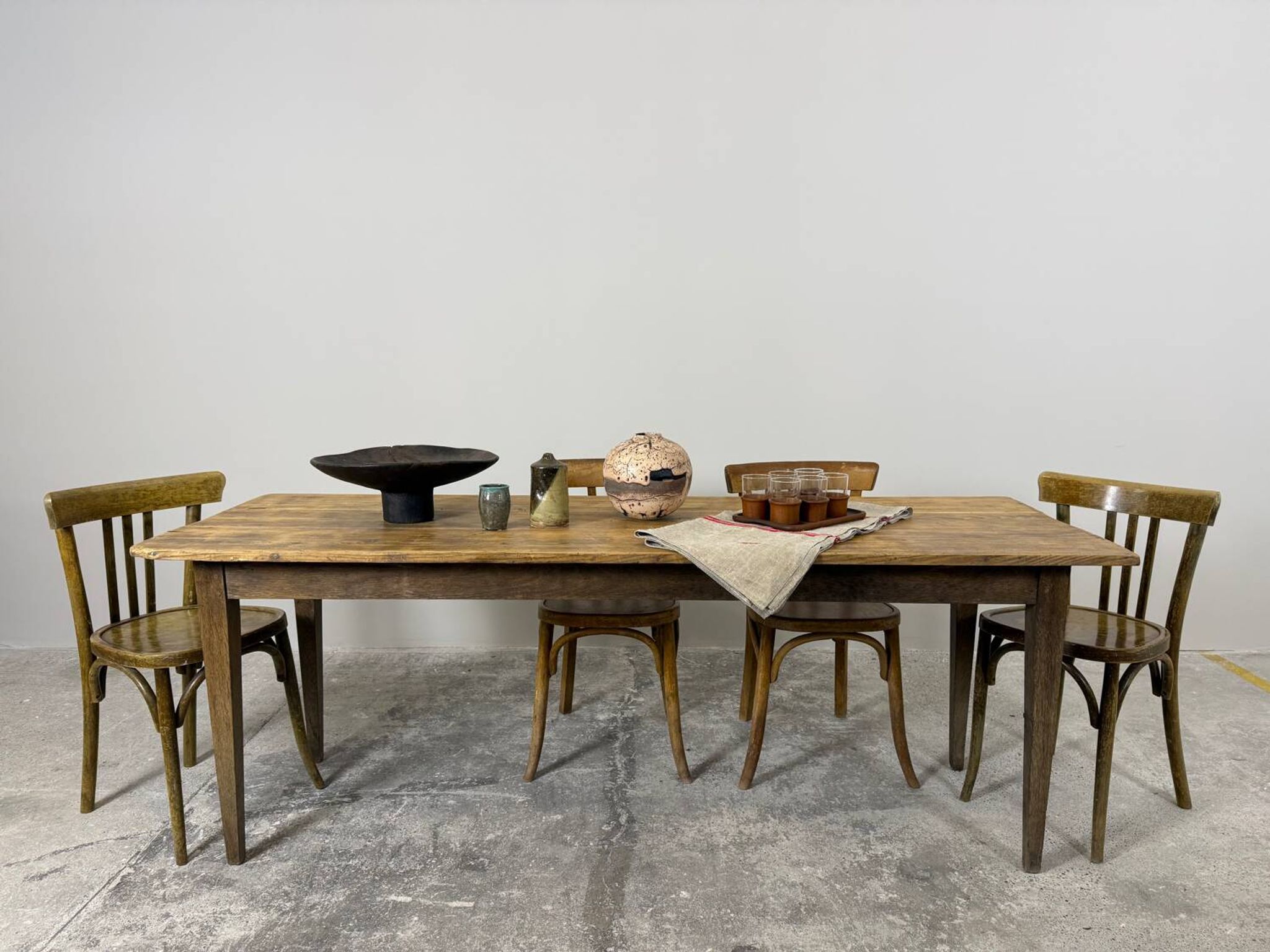 Old farmhouse table with tapered legs, late 19th to early 20th century.