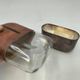 Silver-plated metal flask with leather and glass