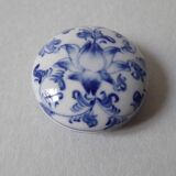 Porcelain pill box decorated with blue and white flowers