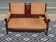 Old bench in wood and orange velvet
