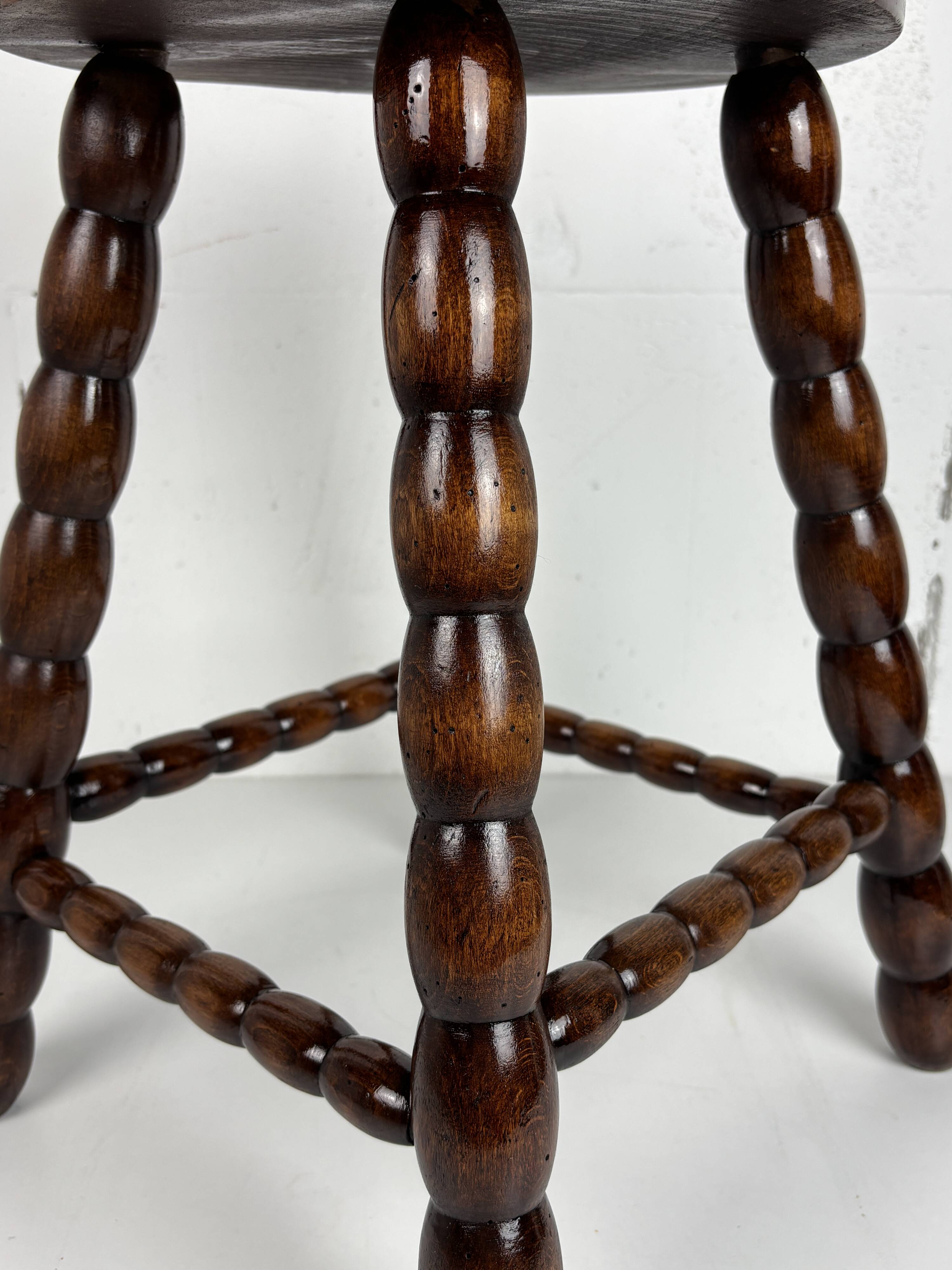 Midcentury bobbin wood turned stool, Charles Dudouyt style, France, 1950s