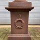 Large cast iron vase with pedestal