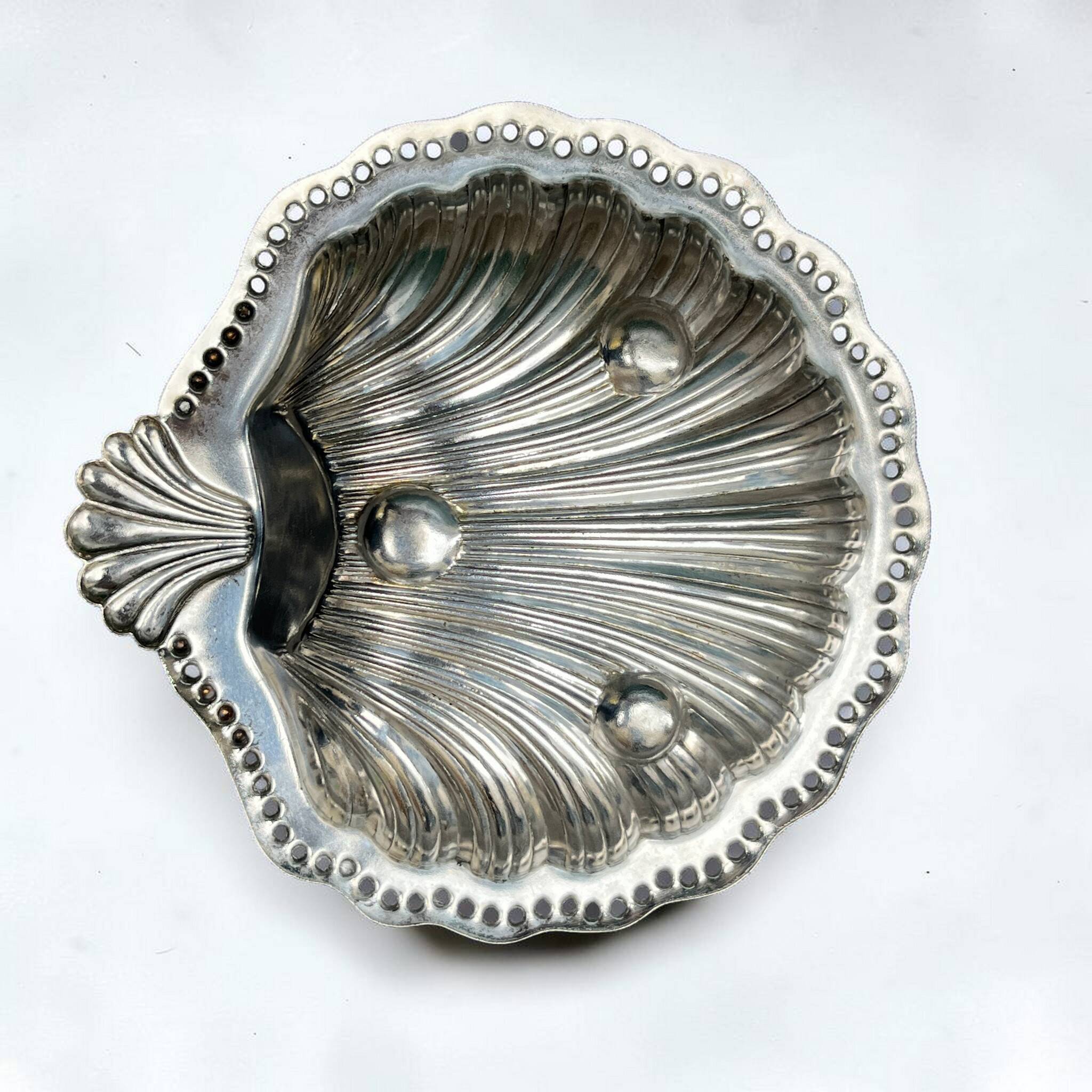 Silver-plated shell butter dish and vintage blue bowl from the 70s.