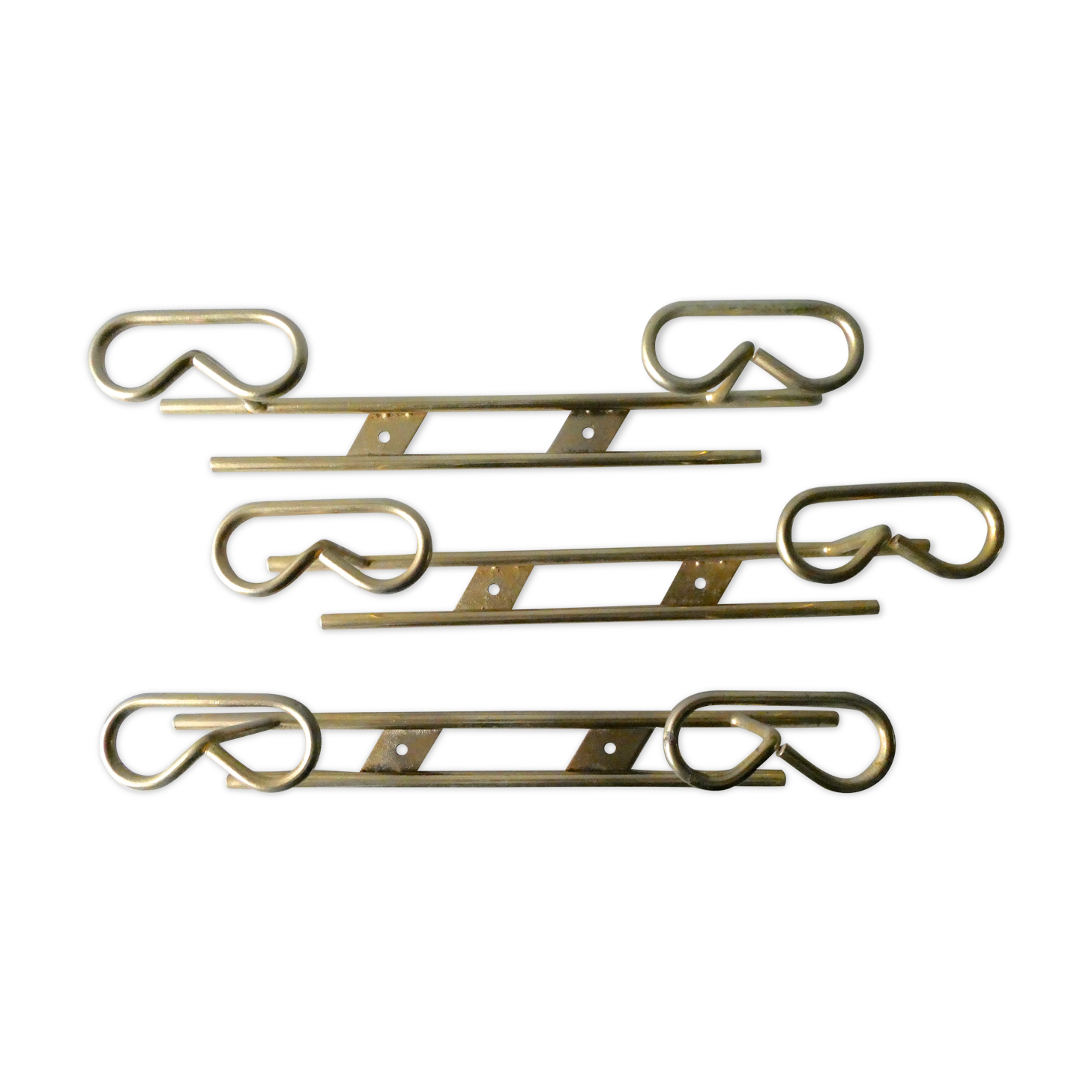 Set of 3 coat hangers in gold metal, 60s