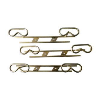 Set of 3 coat hangers in gold metal, 60s