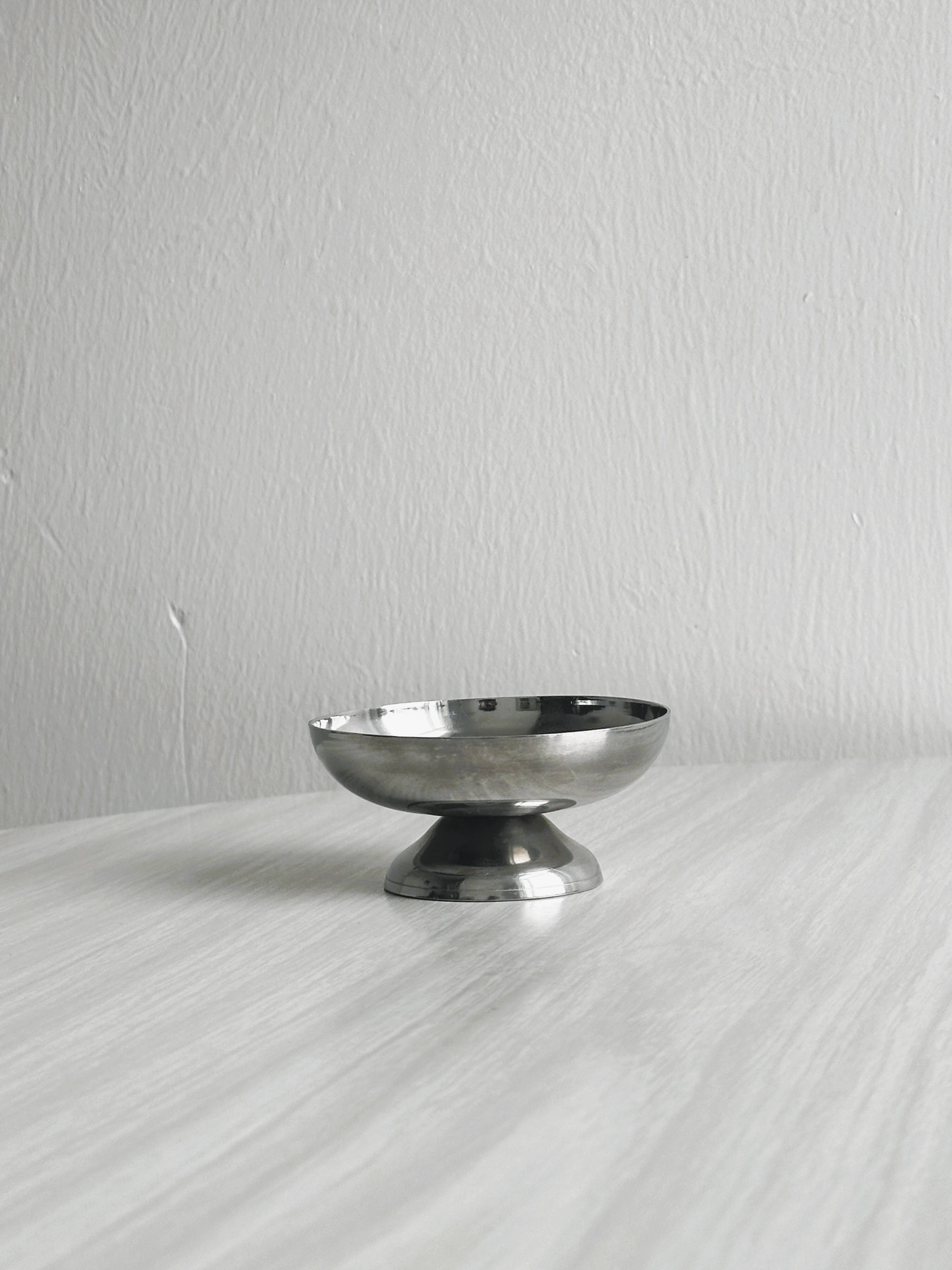 6 stainless steel dessert cups.