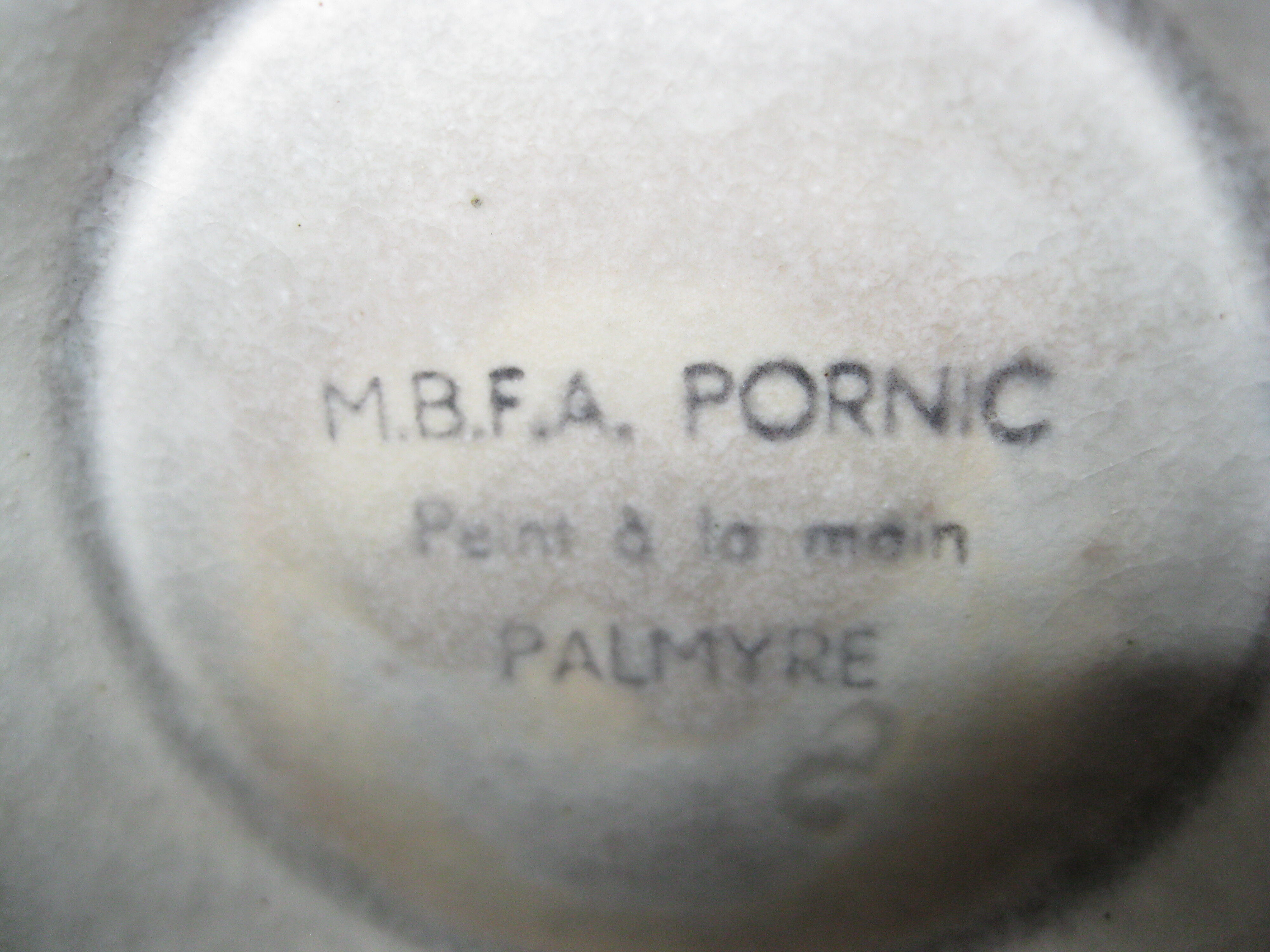 Glazed stoneware jug with hand decoration