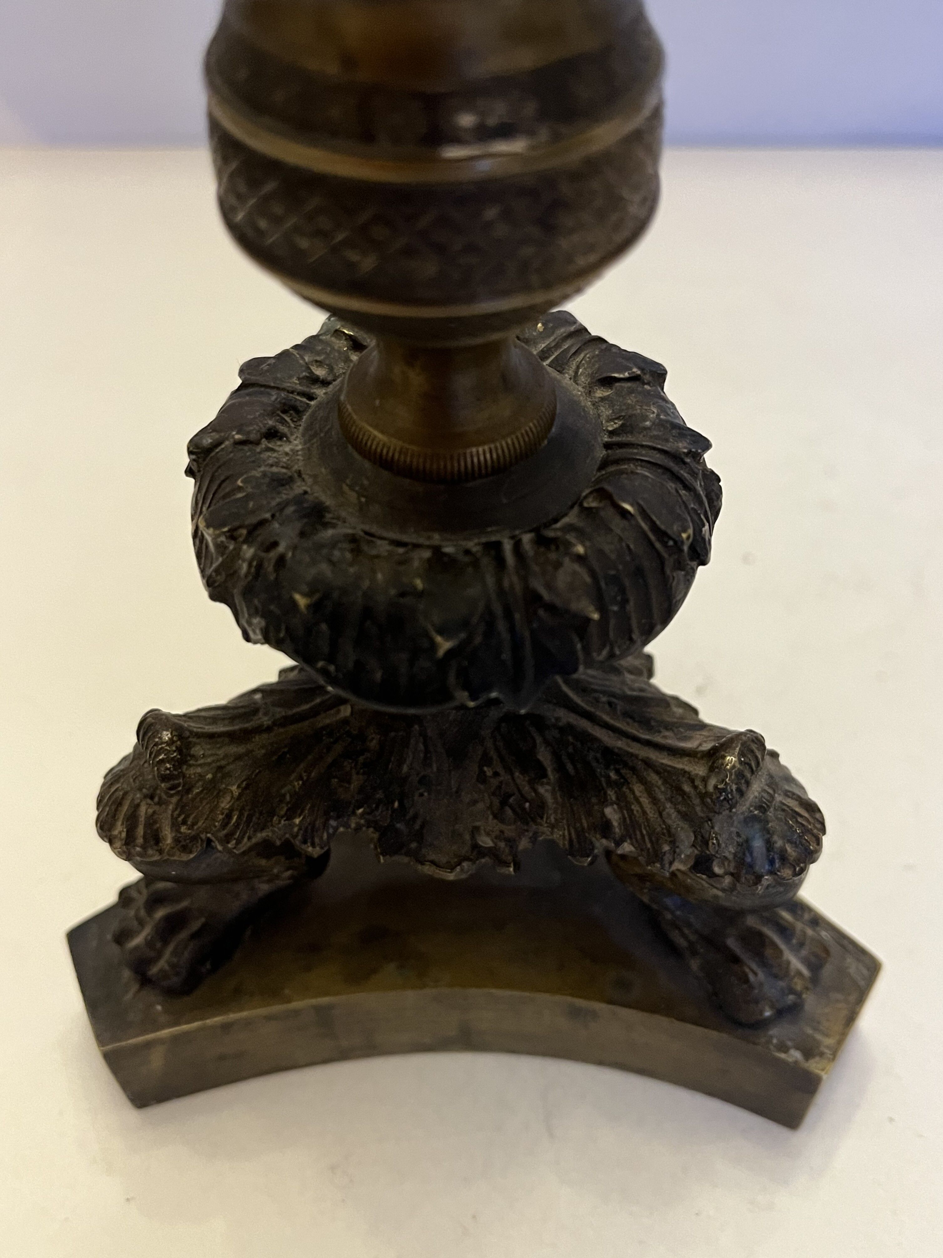 Pair of antique bronze torches