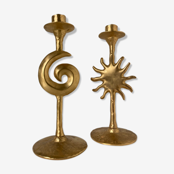 Pair of moon and sun candle holders in golden metal by Édouard Rambaud