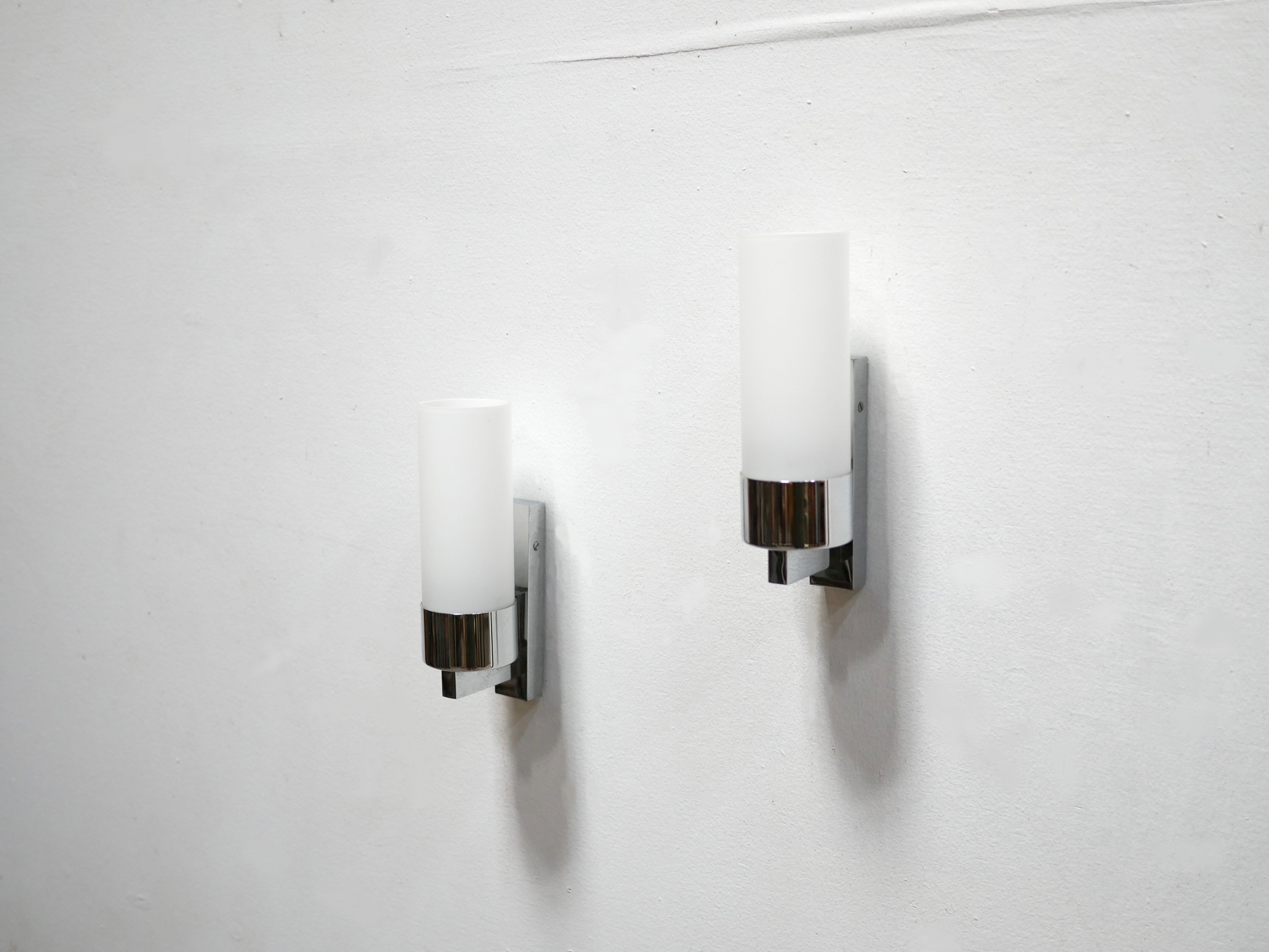 Pair of vintage metal and opaline wall lamps
