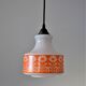 Seventies chandelier in white opaline decorating orange flowers