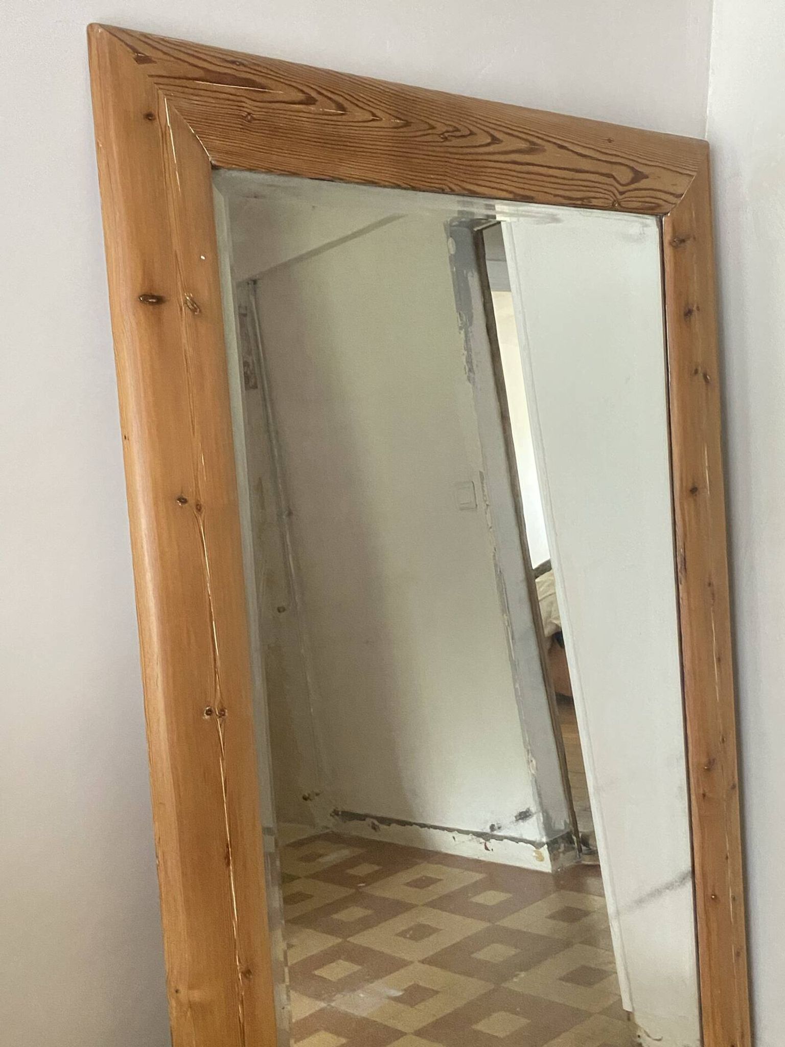 Very large mirror in antique pine.