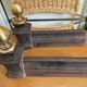 Pair of antique bedside tables in cast iron and brass.