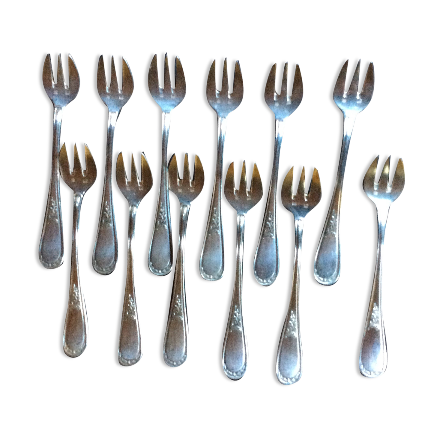 12 oyster forks