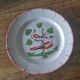 Antique plate with birds