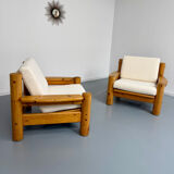 Set of 2 armchairs in solid pine with boucle fabric, 1970s Scandinavian design.