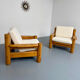Set of 2 armchairs in solid pine with boucle fabric, 1970s Scandinavian design.