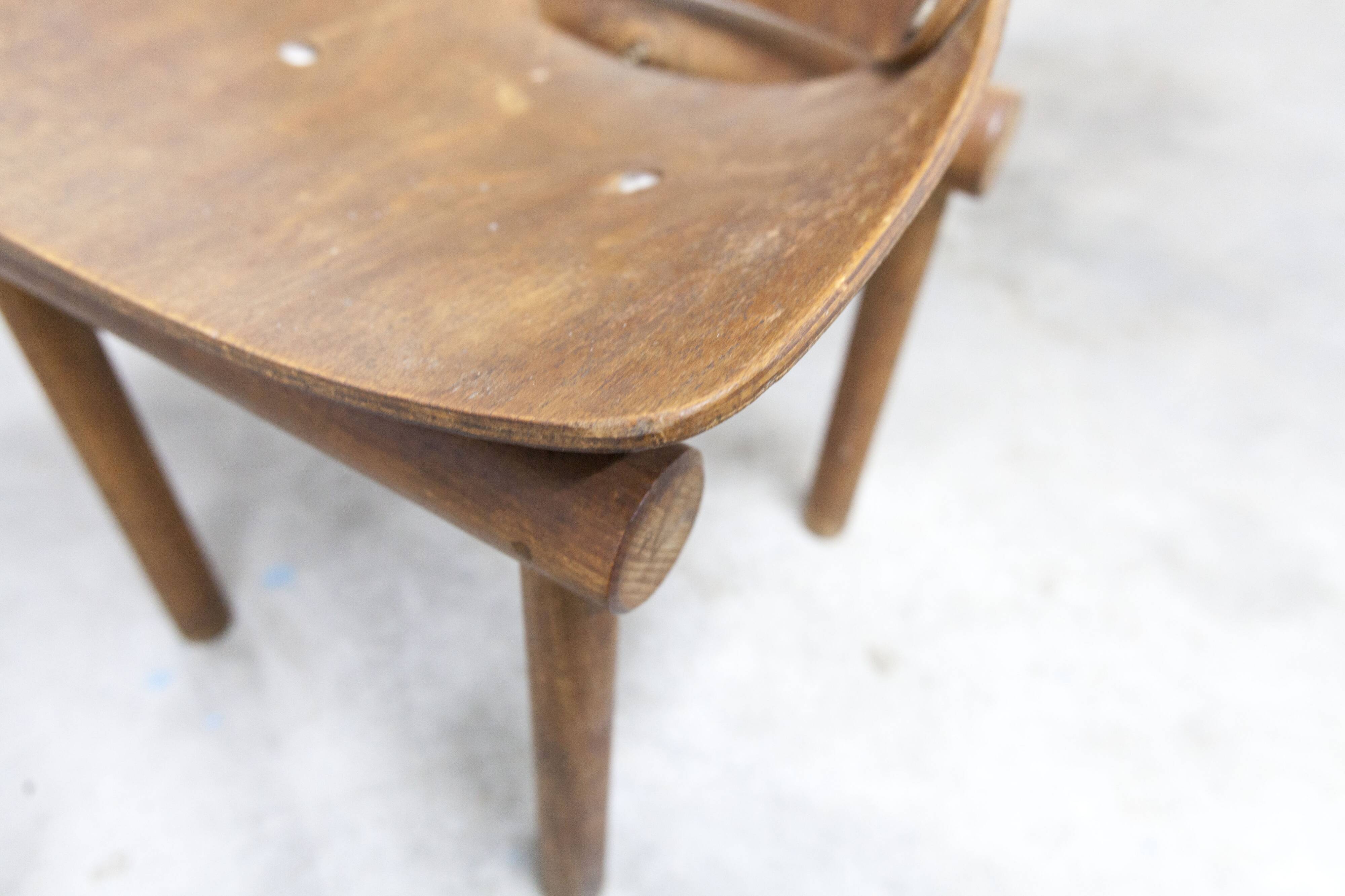 Atypical 1960s curved wood children's chair