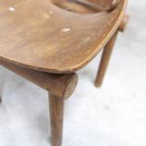Atypical 1960s curved wood children's chair