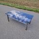Stainless steel and smoked glass coffee table