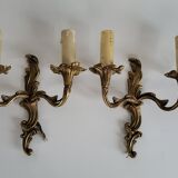 Ancienne paire d'appliques en métal doré style Louis XV - 2 lumières