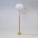 Mid-century floor lamp in brass and oak by Falkenbergs Belysning, Sweden, 1960s.