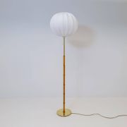 Mid-century floor lamp in brass and oak by Falkenbergs Belysning, Sweden, 1960s.