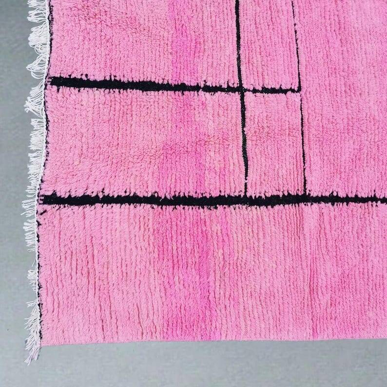 Traditional handwoven Berber rug in pink, size 150x250 cm.